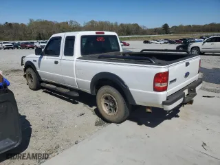 2010 Ford Ranger XL with VIN 1FTKR1ED1APA75380, listed as a Copart auction lot 50027085 with 223,895 mi miles and Salvage Title. Bid and sale history available at carsss.com. Image 2.