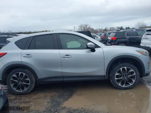 2016 Mazda CX-5 Grand Touring with VIN JM3KE4DY0G0816466, listed as a IAAI auction lot 41720059 with NaN miles. Bid and sale history available at carsss.com. Image 13.