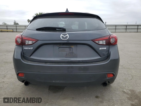 2016 Mazda 3 S Touring with VIN JM1BM1M3XG1299797, listed as a Copart auction lot 54344485 with Not provided miles and Salvage title. Bid and sale history available at DreamBid. Image 6.