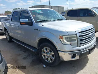 2013 Ford F-150 XL with VIN 1FTFW1CF1DKD51265, listed as a IAAI auction lot 41779068 with 202,468 mi miles and . Bid and sale history available at carsss.com. Image 1.