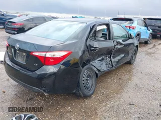 2015 Toyota Corolla L with VIN 5YFBURHE1FP352715, listed as a IAAI auction lot 41696284 with 121,906 mi miles and . Bid and sale history available at DreamBid. Image 4.