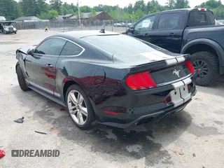 2021 Ford Mustang EcoBoost z VIN 1FA6P8TH4M5117245, wystawiony jako IAAI lot #39793267 z przebiegiem 15 913 mil mil oraz . Historia ofert i sprzedaży dostępna na DreamBid. Obrazek 3.