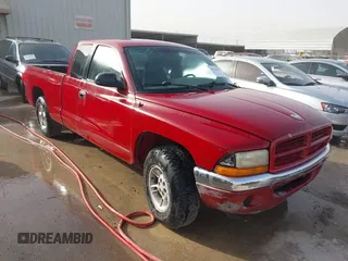 1998 Dodge Dakota SLT with VIN 1B7GL22X3WS662826, listed as a IAAI auction lot 41724569 with 228,660 mi miles. Bid and sale history available at carsss.com. Image 1.