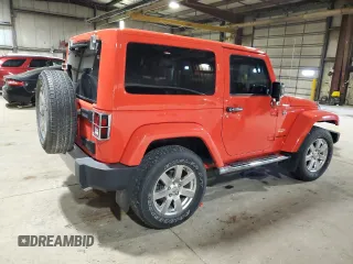 2013 Jeep Wrangler Sahara z VIN 1C4AJWBG2DL569838, wystawiony jako Copart lot #54705065 z przebiegiem 67 093 mil mil oraz Szkoda całkowita • Salvage title. Historia ofert i sprzedaży dostępna na DreamBid. Obrazek 3.