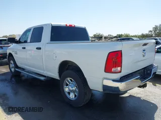 2014 Ram 2500 Tradesman with VIN 3C6TR4CT6EG243306, listed as a IAAI auction lot 41860120 with 101,110 mi miles and . Bid and sale history available at DreamBid. Image 3.