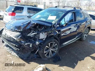2016 Lexus RX 350 with VIN 2T2BZMCA2GC004895, listed as a IAAI auction lot 41859749 with 104,370 mi miles and . Bid and sale history available at DreamBid. Image 2.