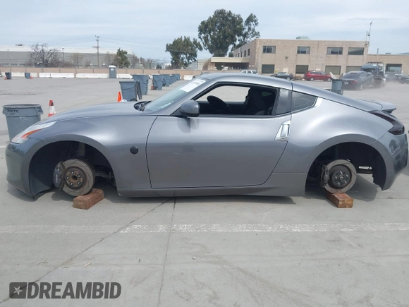 2012 Nissan 370Z Touring with VIN JN1AZ4EH4CM561415, listed as a IAAI auction lot 41838948 with 111,298 mi miles. Bid and sale history available at carsss.com. Image 14.