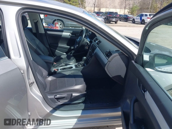 2013 Volkswagen Passat SE w/Sunroof & Nav with VIN 1VWBP7A37DC125598, listed as a IAAI auction lot 42022573 with 149,812 mi miles. Bid and sale history available at carsss.com. Image 5.