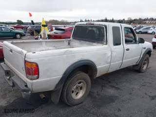 1999 Ford Ranger XLT with VIN 1FTZR15XXXTA09502, listed as a IAAI auction lot 41794904 with 203,276 mi miles. Bid and sale history available at carsss.com. Image 6.