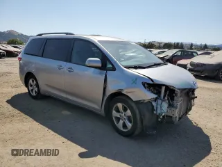 2016 Toyota Sienna LE AAS with VIN 5TDKK3DC3GS748712, listed as a Copart auction lot 60410365 with 96,508 mi miles and Salvage title. Bid and sale history available at DreamBid. Image 4.