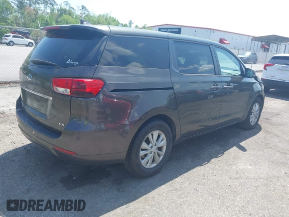 2017 Kia Sedona LX with VIN KNDMB5C15H6225200, listed as a IAAI auction lot 41929710 with 144,461 mi miles. Bid and sale history available at carsss.com. Image 4.