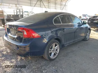 2014 Volvo S60 T5 with VIN YV1612FS2E2282675, listed as a IAAI auction lot 40797039 with 121,598 mi miles. Bid and sale history available at carsss.com. Image 4.