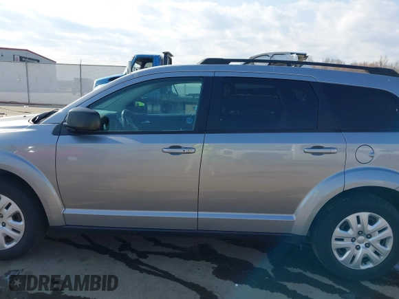 2016 Dodge Journey American Value with VIN 3C4PDCAB3GT234988, listed as a IAAI auction lot 41764190 with 124,077 mi miles and . Bid and sale history available at DreamBid. Image 14.