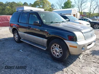 2003 Mercury Mountaineer Convenience z VIN 4M2DU66W13ZJ05239, wystawiony jako IAAI lot #42062881 z przebiegiem 292 631 mil mil oraz . Historia ofert i sprzedaży dostępna na DreamBid. Obrazek 1.