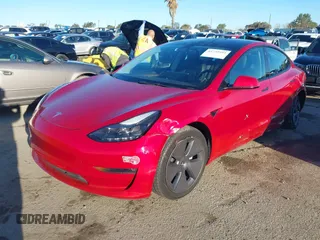 2022 Tesla Model 3 Long Range with VIN 5YJ3E1EB0NF212257, listed as a IAAI auction lot 41735989 with 28,528 mi miles and . Bid and sale history available at DreamBid. Image 2.