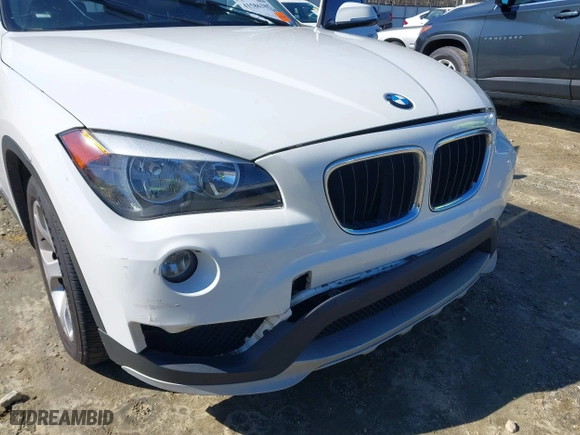 2015 BMW X1 sDrive28i with VIN WBAVM1C53FV317173, listed as a IAAI auction lot 41586385 with 146,068 mi miles. Bid and sale history available at carsss.com. Image 6.