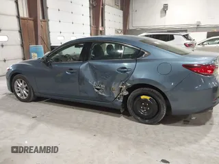 2014 Mazda 6 i Sport with VIN JM1GJ1U61E1148983, listed as a IAAI auction lot 41977553 with 100,668 mi miles and . Bid and sale history available at DreamBid. Image 6.