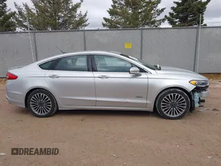 2017 Ford Fusion Titanium with VIN 3FA6P0SU2HR153423, listed as a IAAI auction lot 42029438 with 106,596 mi miles and . Bid and sale history available at DreamBid. Image 13.