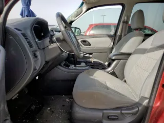 2006 Ford Escape XLT with VIN 1FMYU03136KD25536, listed as a Copart auction lot 56892805 with 187,216 mi miles and Salvage title. Bid and sale history available at DreamBid. Image 7.