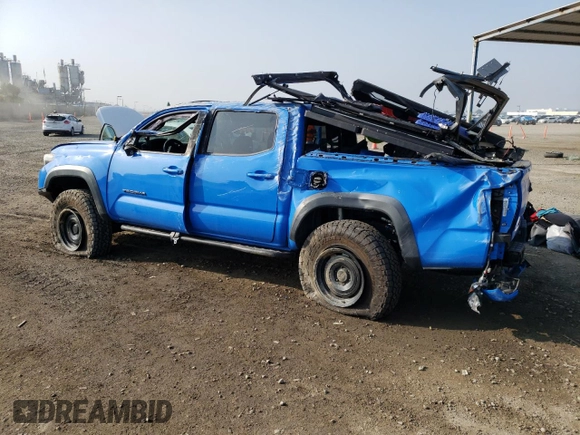 2020 Toyota Tacoma SR5 z VIN 3TMCZ5AN6LM310164, wystawiony jako Copart lot #47098995 z przebiegiem 18 285 mil mil oraz Szkoda całkowita • Salvage title. Historia ofert i sprzedaży dostępna na DreamBid. Obrazek 2.