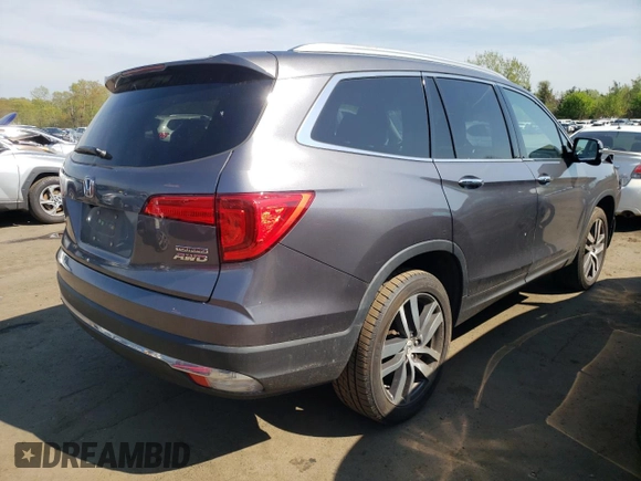 2017 Honda Pilot Touring with VIN 5FNYF6H9XHB023385, listed as a Copart auction lot 55482975 with 105,039 mi miles and Salvage Title. Bid and sale history available at carsss.com. Image 3.