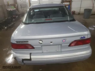 1994 Ford Taurus GL with VIN 1FALP52U5RG255078, listed as a Copart auction lot 86631304 with 86,662 mi miles and Salvage Title. Bid and sale history available at carsss.com. Image 6.