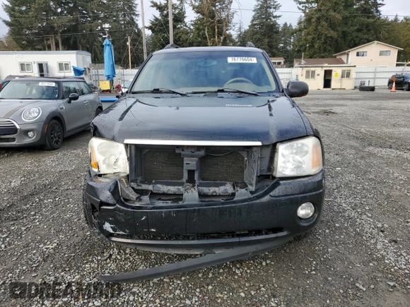 2003 GMC Envoy XL SLT with VIN 1GKES16S036191987, listed as a Copart auction lot 76776604 with 253,889 mi miles and Salvage Title. Bid and sale history available at carsss.com. Image 5.