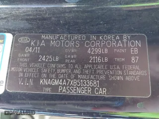 2011 Kia Optima LX with VIN KNAGM4A7XB5133681, listed as a IAAI auction lot 41602973 with 210,615 mi miles. Bid and sale history available at carsss.com. Image 9.