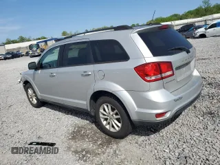 2014 Dodge Journey SXT z VIN 3C4PDCBG7ET126901, wystawiony jako Copart lot #52882625 z przebiegiem 176 923 mil mil oraz Szkoda całkowita • Salvage title. Historia ofert i sprzedaży dostępna na DreamBid. Obrazek 2.