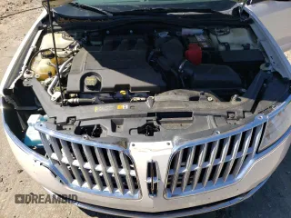 2012 Lincoln MKZ z VIN 3LNHL2GC3CR800619, wystawiony jako Copart lot #57872365 z przebiegiem 66 280 mil mil oraz Szkoda całkowita • Salvage title. Historia ofert i sprzedaży dostępna na DreamBid. Obrazek 11.