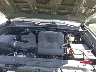 2022 Toyota Tacoma SR with VIN 3TMCZ5AN0NM470396, listed as a IAAI auction lot 41909515 with 35,997 mi miles and . Bid and sale history available at DreamBid. Image 10.