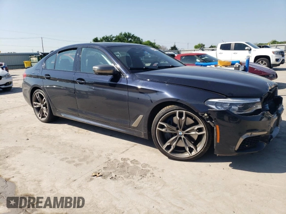 2019 BMW 5 Series M550i xDrive z VIN WBAJB9C56KB464277, wystawiony jako Copart lot #52348835 z przebiegiem 46 131 mil mil oraz Szkoda całkowita • Salvage title. Historia ofert i sprzedaży dostępna na DreamBid. Obrazek 4.
