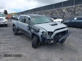 2018 Toyota Tacoma SR5 with VIN 3TMDZ5BN3JM039497, listed as a IAAI auction lot 42326823 with 92,977 mi miles and . Bid and sale history available at DreamBid. Image 6.