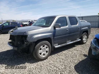 2007 Honda Ridgeline RTL z VIN 2HJYK165X7H500996, wystawiony jako Copart lot #56348405 z przebiegiem 137 028 mil mil oraz Szkody całkowita. Historia ofert i sprzedaży dostępna na DreamBid. Obrazek 1.