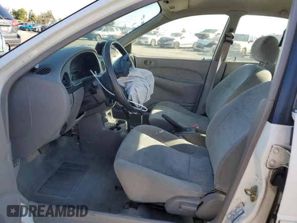 1997 Ford Escort LX with VIN 1FALP13PXVW380014, listed as a Copart auction lot 86107594 with 145,491 mi miles and Salvage Title. Bid and sale history available at carsss.com. Image 7.
