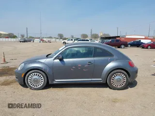2014 Volkswagen Beetle 2.5L with VIN 3VWJX7AT7EM608634, listed as a IAAI auction lot 41783090 with 139,106 mi miles and . Bid and sale history available at DreamBid. Image 14.