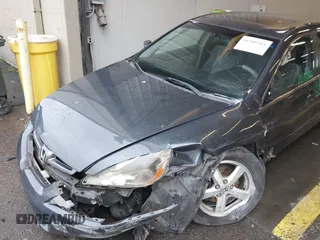 2005 Honda Accord EX with VIN JHMCM56755C007601, listed as a IAAI auction lot 41209511 with 238,715 mi miles and . Bid and sale history available at DreamBid. Image 6.
