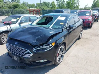 2017 Ford Fusion Titanium with VIN 3FA6P0K9XHR117300, listed as a IAAI auction lot 42731703 with 47,276 mi miles and . Bid and sale history available at DreamBid. Image 6.
