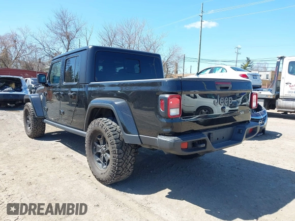 2022 Jeep Gladiator Texas Trail with VIN 1C6HJTAG2NL120506, listed as a IAAI auction lot 42048215 with 65,048 mi miles. Bid and sale history available at carsss.com. Image 3.