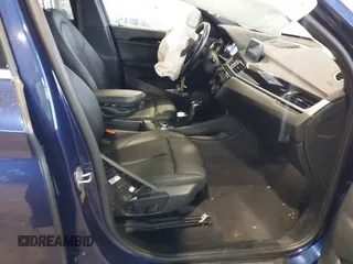 2019 BMW X1 xDrive28i with VIN WBXHT3C55K5L37338, listed as a IAAI auction lot 41934461 with 87,913 mi miles. Bid and sale history available at carsss.com. Image 5.
