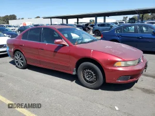 2002 Mitsubishi Galant ES z VIN 4A3AA46G12E090145, wystawiony jako Copart lot #68953104 z przebiegiem 135 395 mil mil oraz Szkody całkowita. Historia ofert i sprzedaży dostępna na DreamBid. Obrazek 4.