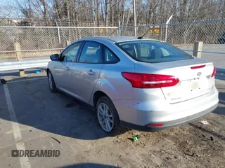 2018 Ford Focus SE with VIN 1FADP3F28JL239860, listed as a IAAI auction lot 41497350 with 84,666 mi miles. Bid and sale history available at carsss.com. Image 3.