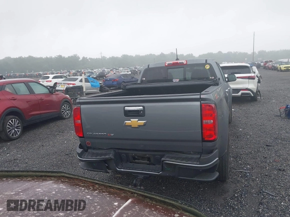 2018 Chevrolet Colorado 4WD Z71 with VIN 1GCGTDEN3J1327344, listed as a IAAI auction lot 42471944 with 153,499 mi miles and . Bid and sale history available at DreamBid. Image 16.