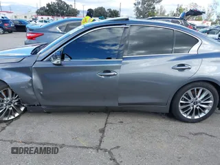 2019 Infiniti Q50 Luxe z VIN JN1EV7APXKM512617, wystawiony jako IAAI lot #41517907 z przebiegiem 46 619 mil mil oraz . Historia ofert i sprzedaży dostępna na DreamBid. Obrazek 14.