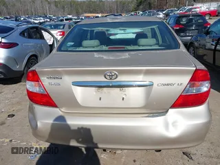 2002 Toyota Camry LE z VIN 4T1BE32K02U051709, wystawiony jako IAAI lot #41485620 z przebiegiem 232 876 mil mil oraz . Historia ofert i sprzedaży dostępna na DreamBid. Obrazek 16.