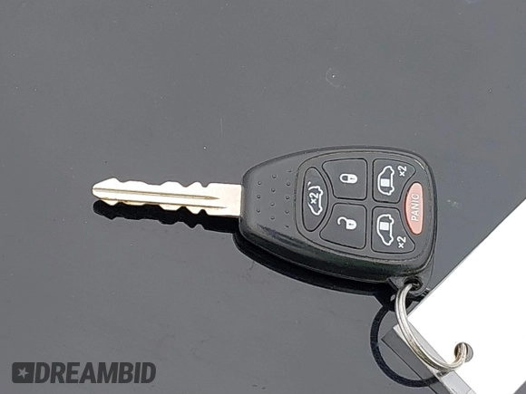2005 Dodge Caravan SXT with VIN 2D4GP44LX5R115310, listed as a IAAI auction lot 41668454 with 115,784 mi miles and . Bid and sale history available at DreamBid. Image 11.