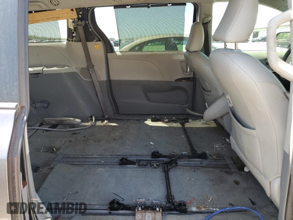 2013 Toyota Sienna XLE AAS with VIN 5TDYK3DC2DS372879, listed as a Copart auction lot 52174275 with 213,923 mi miles and Clean Title. Bid and sale history available at carsss.com. Image 11.