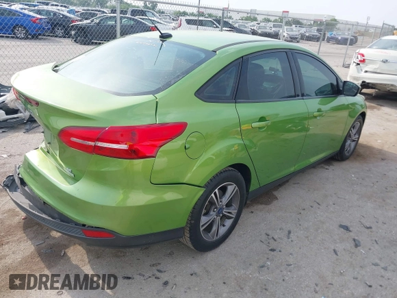 2018 Ford Focus SE z VIN 1FADP3FE5JL222542, wystawiony jako IAAI lot #42265608 z przebiegiem 107 397 mil mil oraz . Historia ofert i sprzedaży dostępna na DreamBid. Obrazek 4.