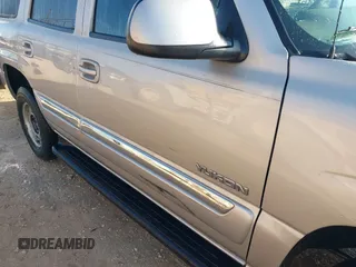 2005 GMC Yukon SLT with VIN 1GKEK13T95R203827, listed as a IAAI auction lot 41815086 with 136,671 mi miles. Bid and sale history available at carsss.com. Image 17.