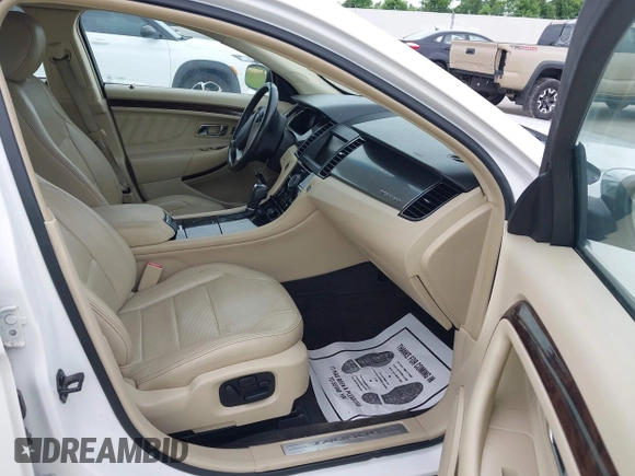 2013 Ford Taurus Limited with VIN 1FAHP2F8XDG127848, listed as a IAAI auction lot 42498773 with 103,299 mi miles and . Bid and sale history available at DreamBid. Image 5.